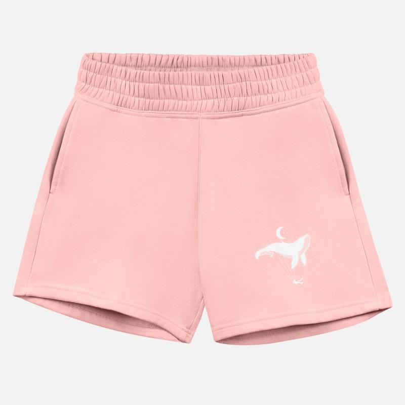 Blue Whale swinging in front of crescent Moon